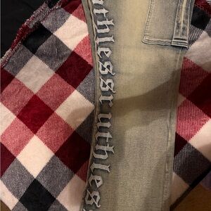 Fashion Nova Tan Jeans with Distressed Lettering